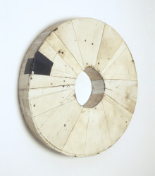 #28, 29" diameter x 4.5", enamel, plaster, resin, tar, wax and wood, 1997-2000
